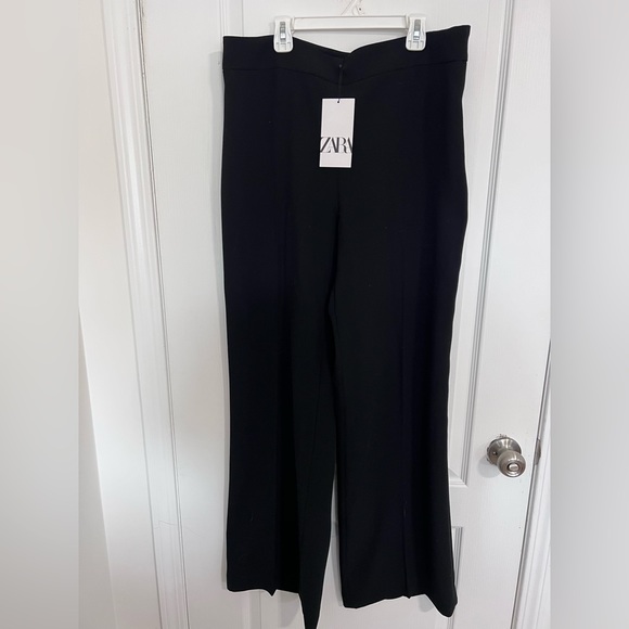 NWT. Zara high waisted black wide leg dress pant with side zipper. - Picture 1 of 3